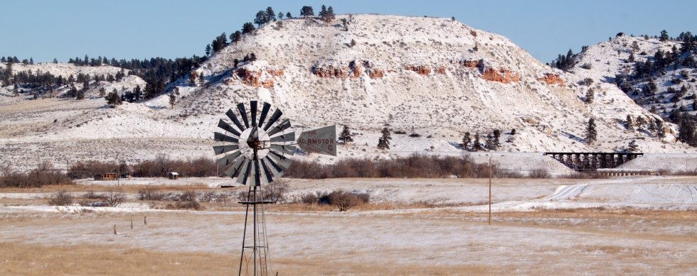 Old windmill in winter near Hardin, Montana