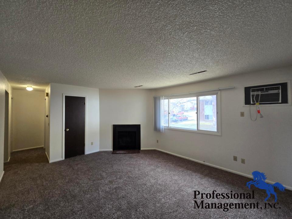 Livingroom w/ Decorative Fire Place