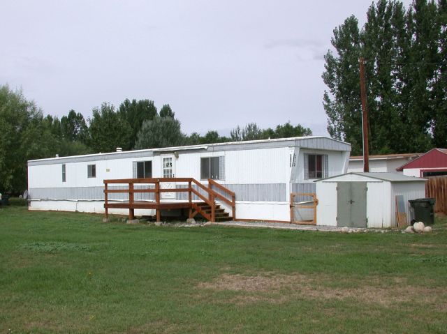 Front View with storage shed