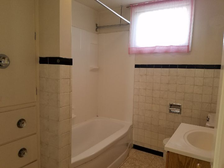 Full Bathroom with Built in Storage