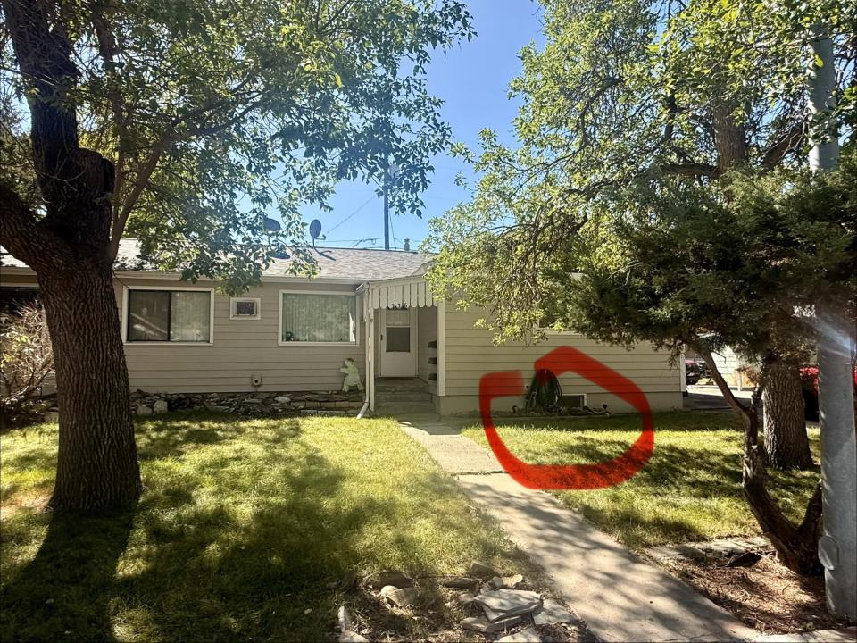 Front of Building with Basement Window Circled