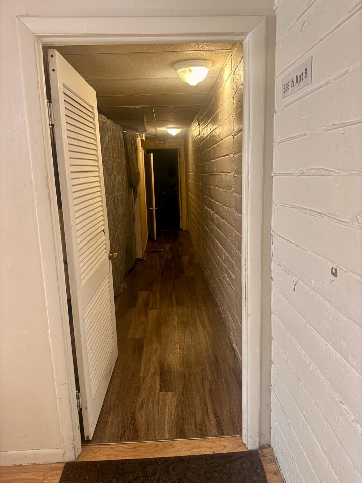 Entry Door to Apartment Hallway.