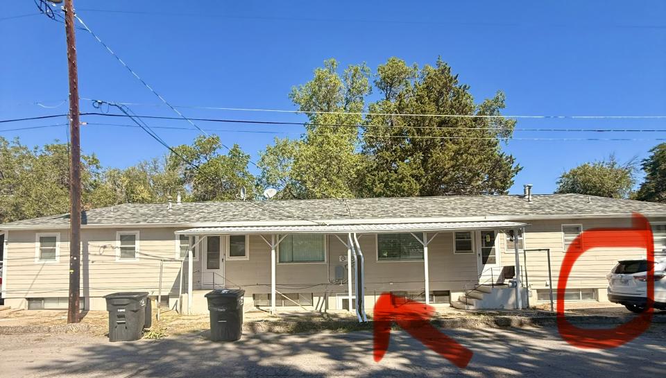 Entry to Basement Apartment in the Back & Parking Spot.