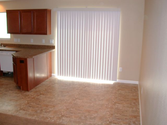 Dining area with entrance to back patio