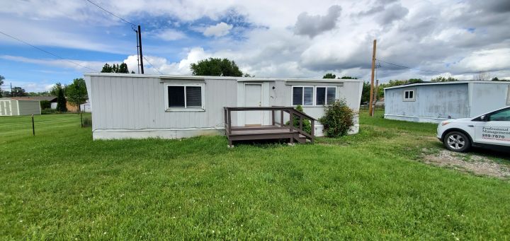 Front of Mobile Home w/ Newer Deck