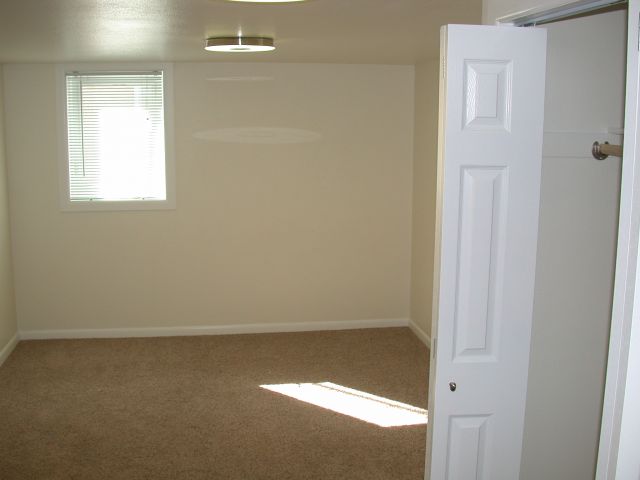 Bedroom with double door closet