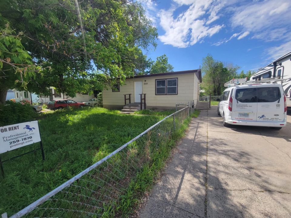 Front of Home with Fully Fenced Yard