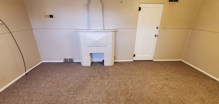 Bright Living Room w/ Deco Fireplace