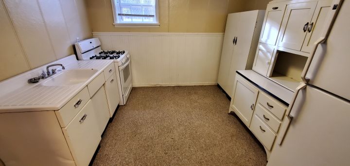 Kitchen w/ Large Fridge & Gas Stove