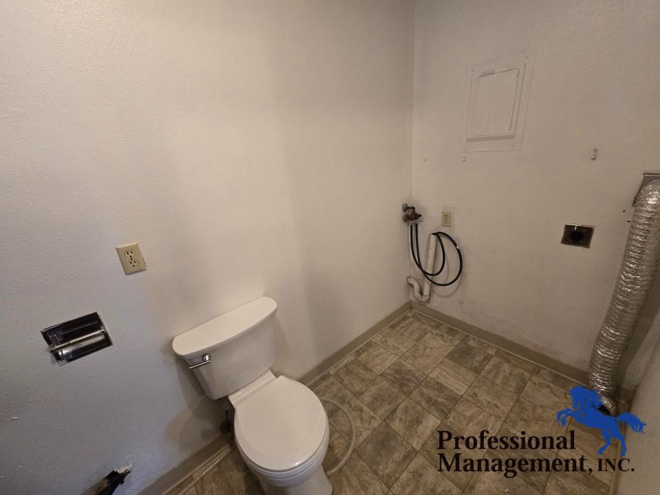 Washer and Dryer Hook Up with 1/4 Bathroom