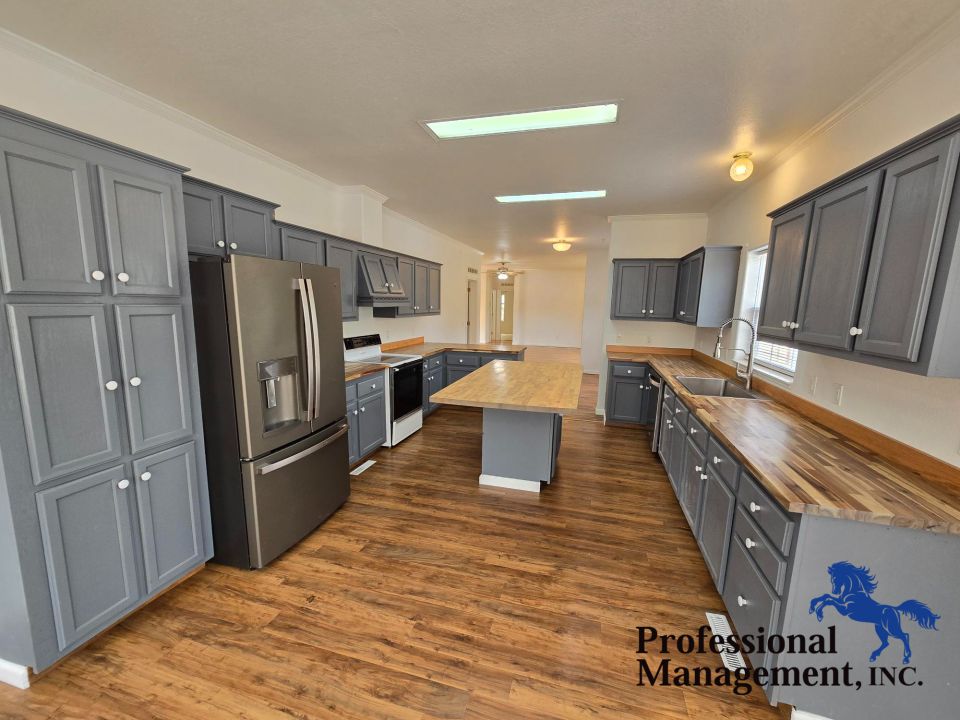 Kitchen with Plenty of Storage and Natural ...