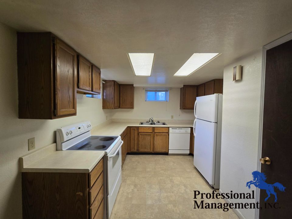 Kitchen w/ Washer and Dryer