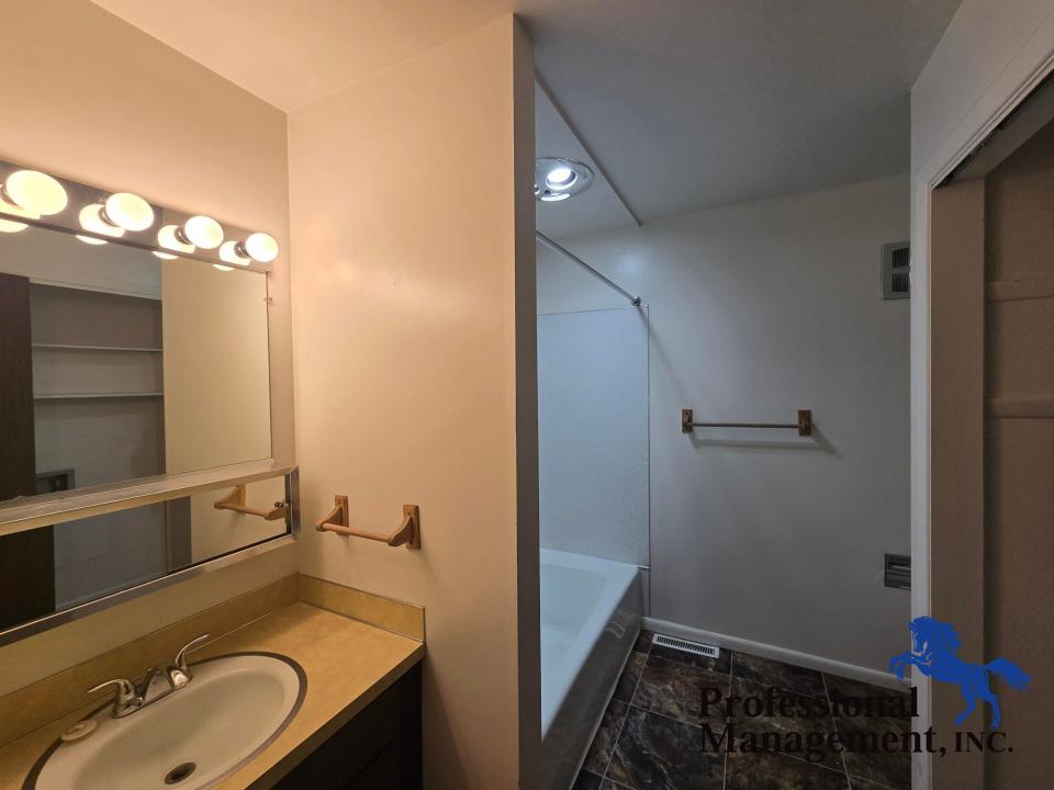 Full Bath w/ Washer and Dryer Hook Ups