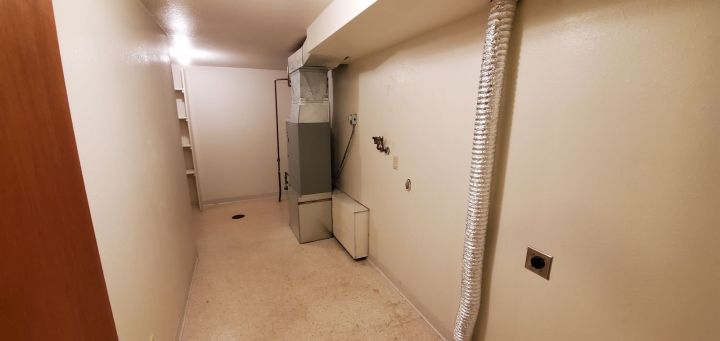 Utility Room w/ Pantry and W/D Hookups