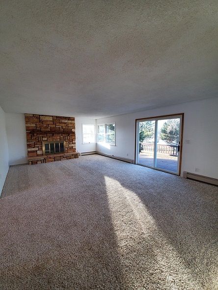 Upstairs Living Room with Decorative Fireplace