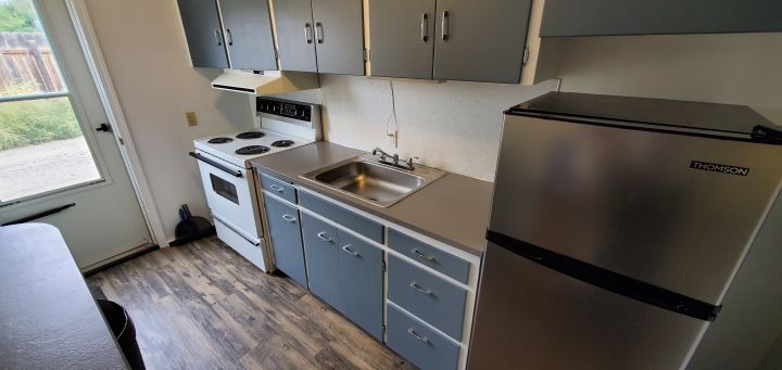 Galley Style Kitchen w/ New Flooring