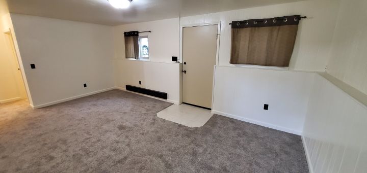 Living Room w/ New Carpet & Paint
