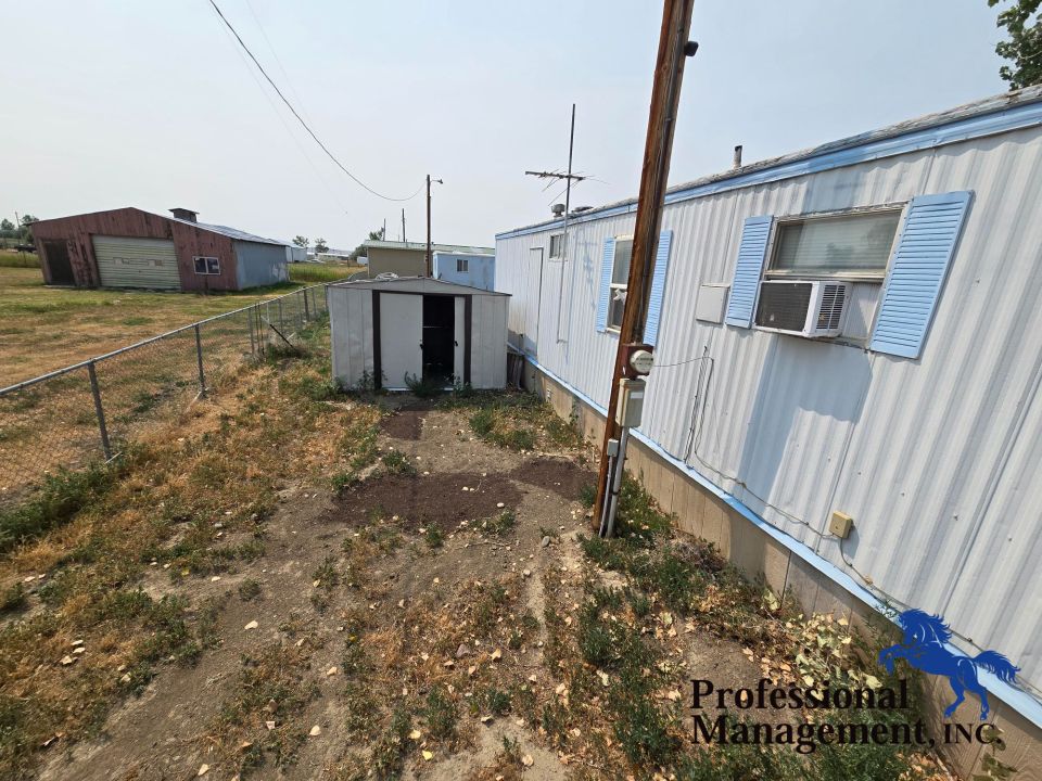 Side of Unit and Shed