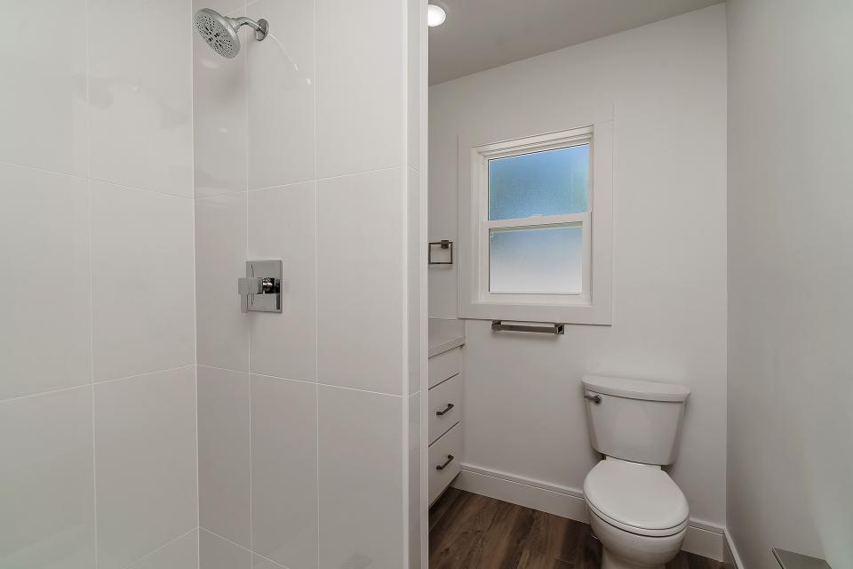 Bathroom off Bedroom with Beautiful Quality Tiled Shower